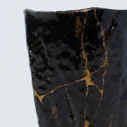 Close-up side view of Pentagon Kintsugi Cup "Tenmoku" Black 03