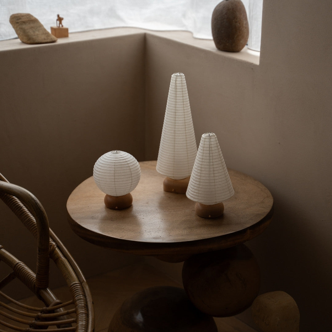 Three Japanese Paper Table Lamps on wooden table in Japandi style living room – Japandi paper lanterns for bedroom & living room