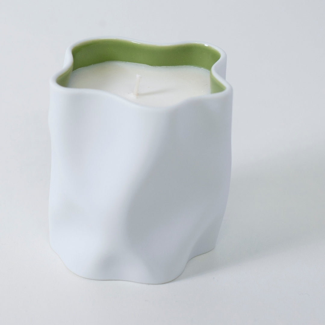 Top view of Japanese candle MATCHA with matcha, bamboo, and Japanese Incense in white porcelain cup
