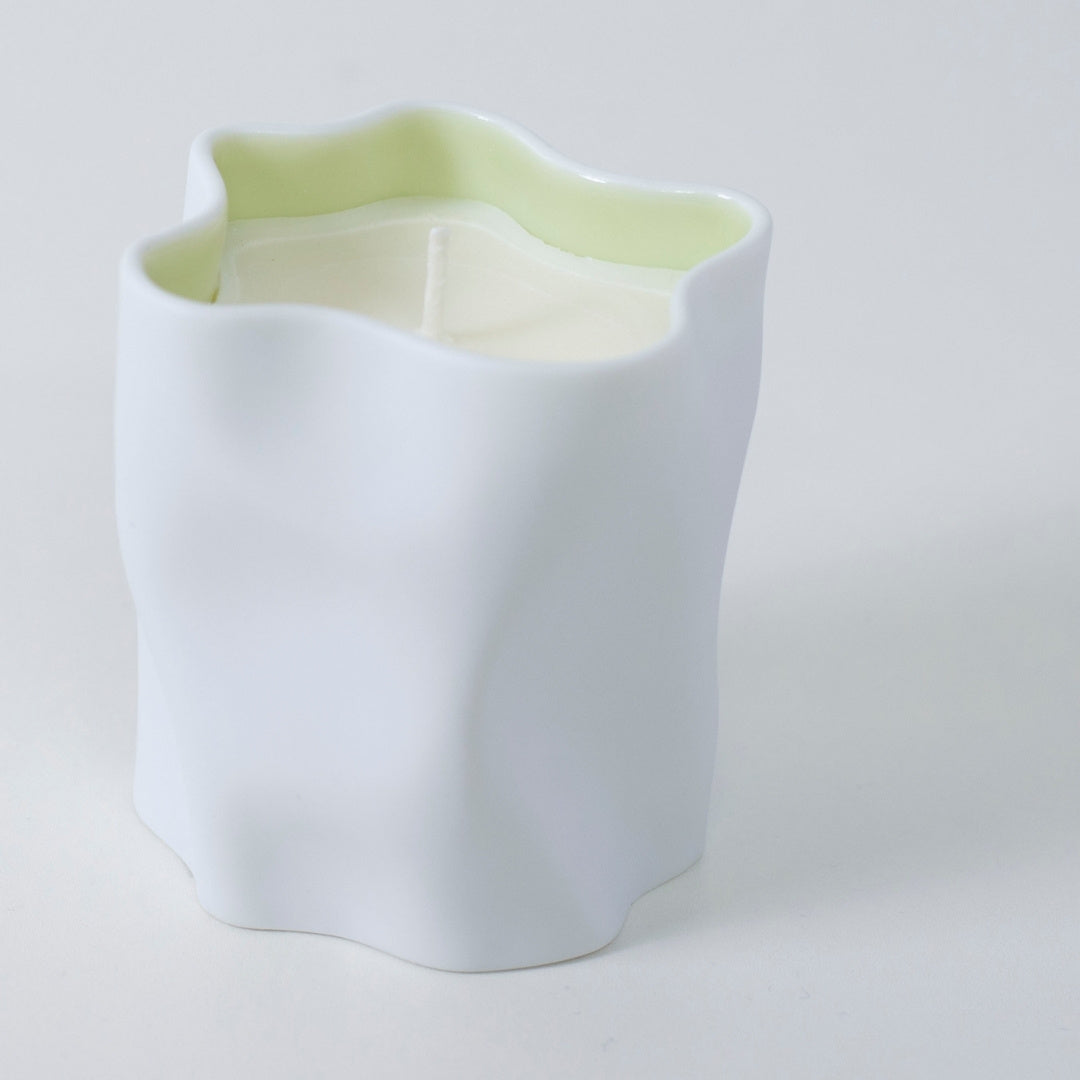 Top view of Japanese candle WASHI with hinoki, ylang-ylang, and Japanese Incense in white ceramic