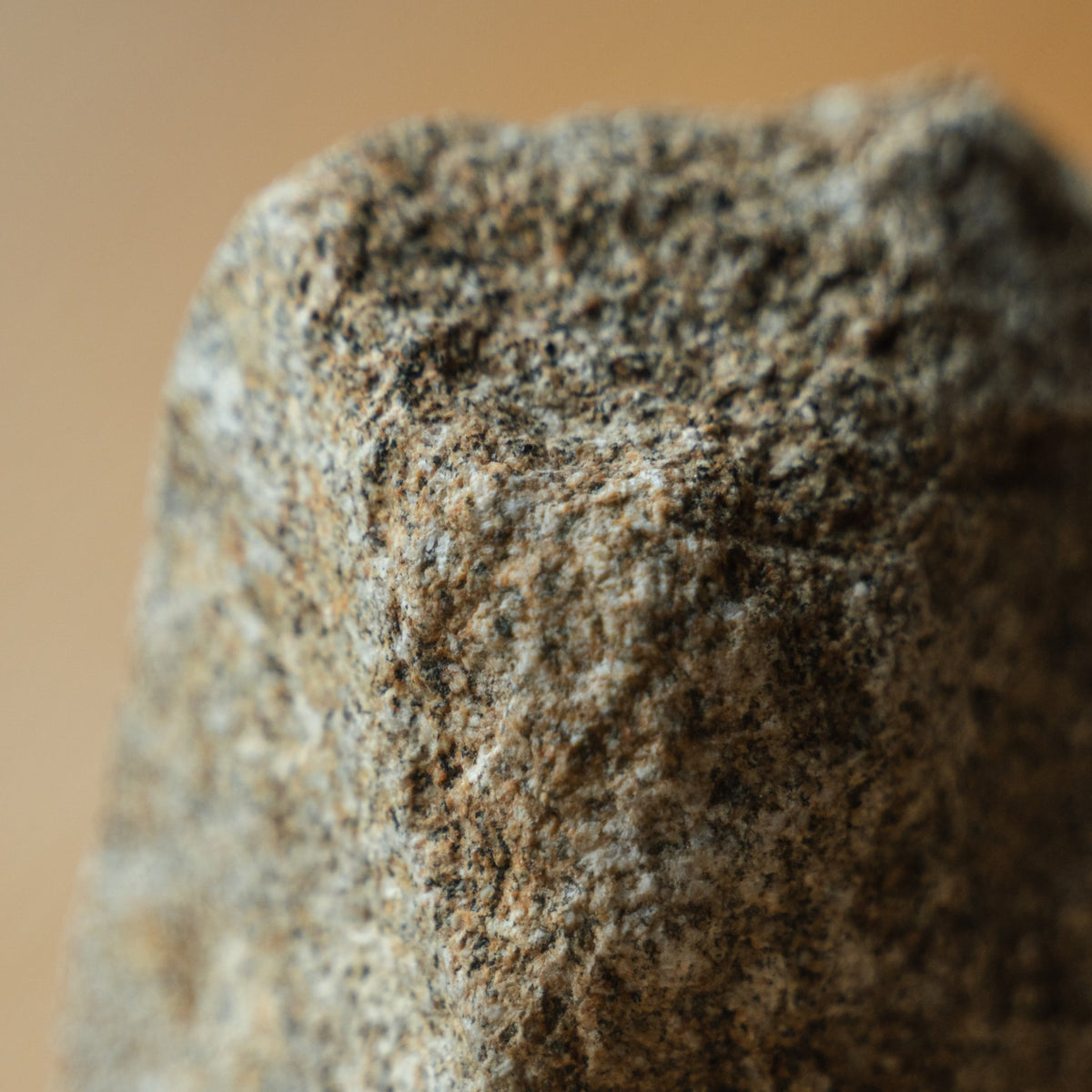 Japanese Aji Stone Book End Small in natural stone styled in a interior space, interior scene view.