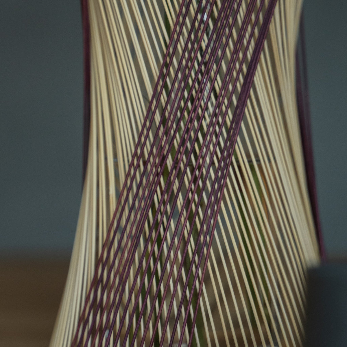 Japanese Bamboo Flower Vase "Fleeting Moment" in brown & purple styled in a styled room, detail lifestyle view.