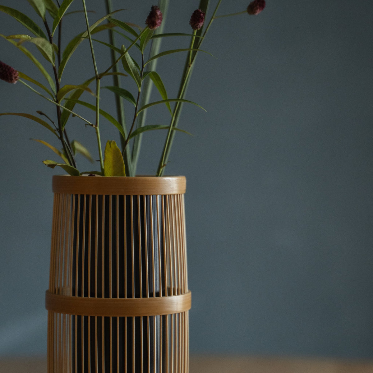 Japanese Bamboo Flower Vase "Shiori" in brown styled in a styled room, detail lifestyle view.