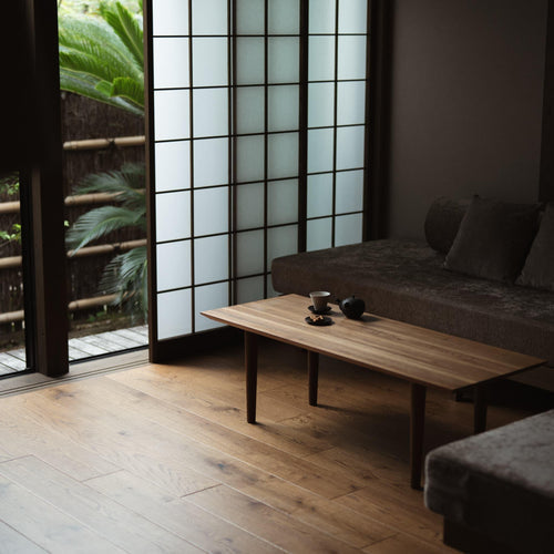 Japanese tea ware on a wood table in Japanese style room