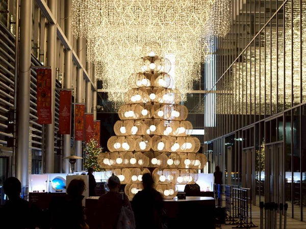 A decorative Christmas lamp tree made of traditional Japanese bamboo craft, displayed at the Tokyo Midtown Yaesu Special Christmas Market.