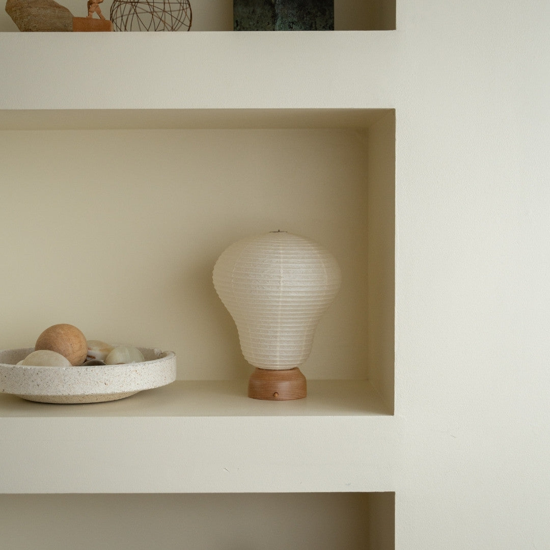 Japanese Paper Table Lamp "Balloon" on a white shelf in Japandi style room – Wabi-Sabi paper table lamps for Japandi living room