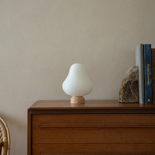 Japanese Paper Table Lamp "Mountain" on wooden shelf in Japandi style room – Stylish Wabi-Sabi lamp for Japandi living room