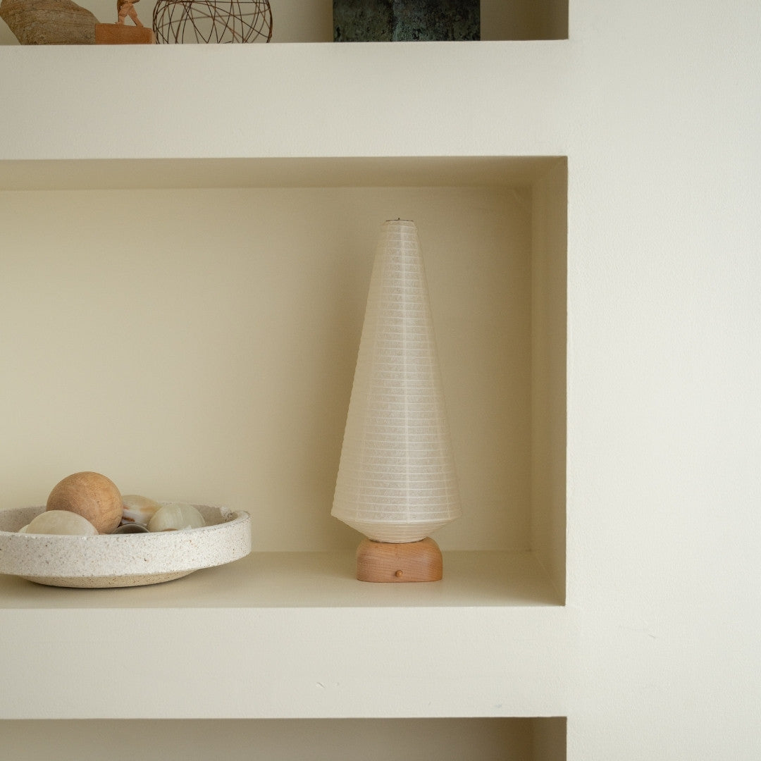Japanese Paper Table Lamp "Tree" on a white shelf in Japandi style living room – Unique paper table lamp for Japandi interiors
