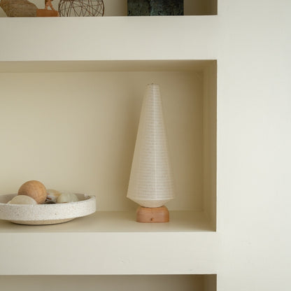 Japanese Paper Table Lamp "Tree" on a white shelf in Japandi style living room – Unique paper table lamp for Japandi interiors