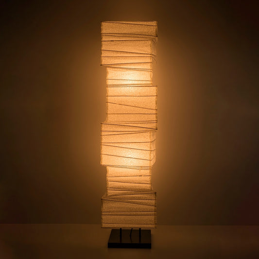Japanese Washi Paper Floor Lamp "Harusame Washi 01" illuminating a dark room – Stylish paper lamp for Japandi living room