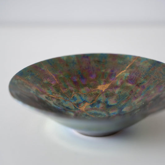 Close-up of Kintsugi Bowl "Green Nebula" 
 side, highlighting the intricate Kintsugi repairs