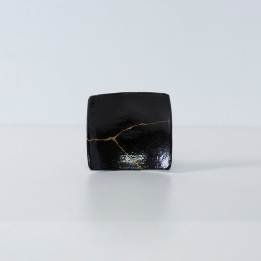Side view of Kintsugi Square Plate "Jet Black Lighting" 03 in a white background