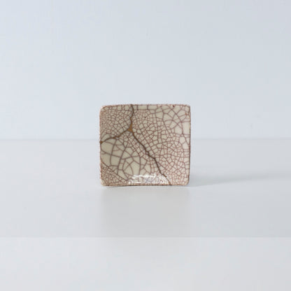 Side view of Kintsugi Square Plate "Vermilion Crackle" 03 in a white background