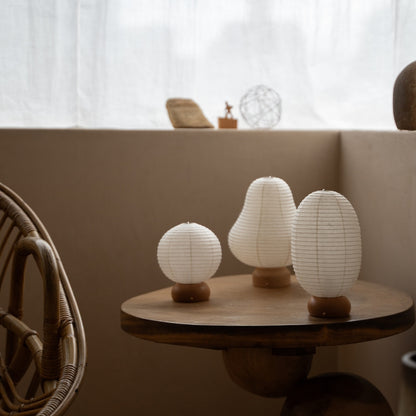 Three Unique Japanese Paper Table Lamps on wooden table in Japandi style room – Unique table lamps for Japandi living room
