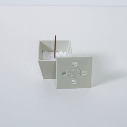 Top view of PORCELAIN INCENSE BURNER WHITE with incense stick - Sophisticated ceramic incense holder for Japandi decor