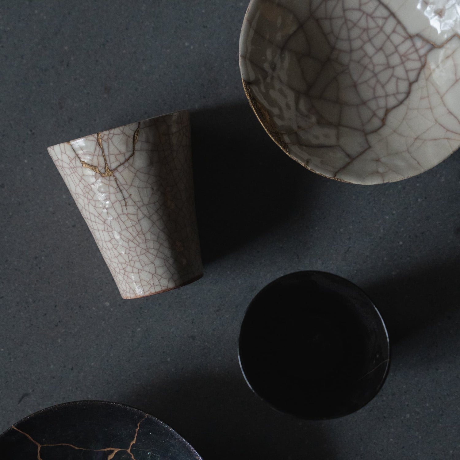 Kintsugi pottery: Japanese kintsugi art, cups and bowls. 