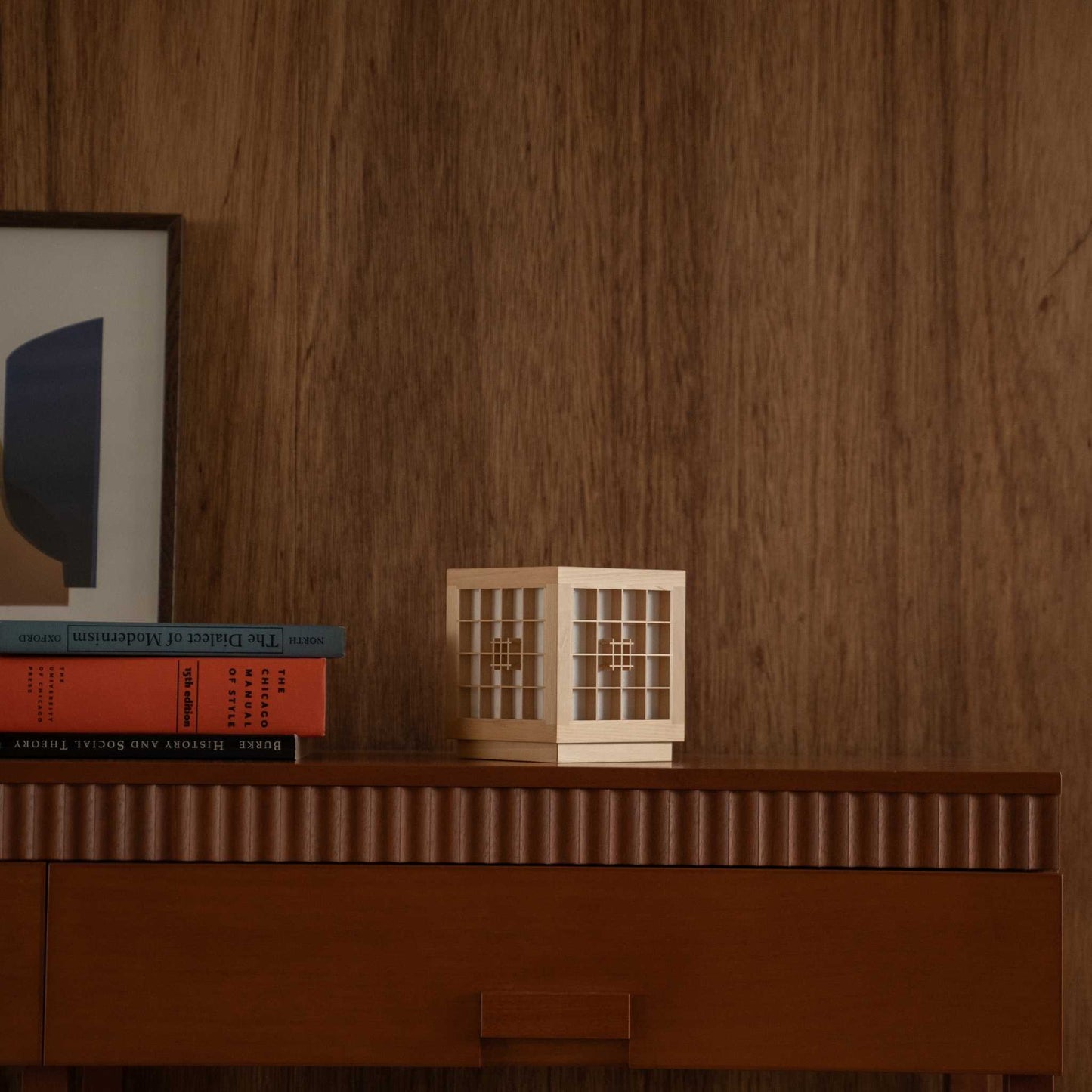 Unlit Japanese Wood Table Lamp "Honoka" displaying Kumiko woodworking on a mid-century modern wooden console table.