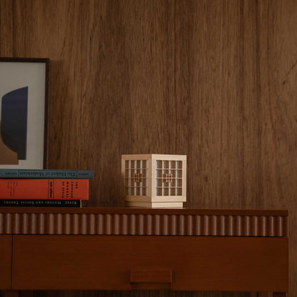 Unlit Japanese Wood Table Lamp "Honoka" displaying Kumiko woodworking on a mid-century modern wooden console table.