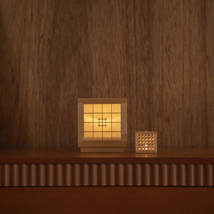 Cordless Japanese table lamp "Honoka" and "Hotaru" serving as cozy accent lamps on a mid-century modern console.