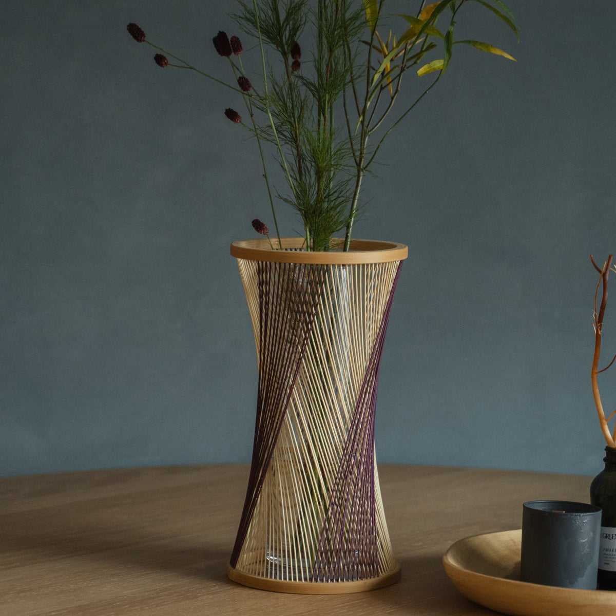 Japanese Bamboo Flower Vase "Fleeting Moment" in brown & purple styled in a styled room, detail lifestyle view.