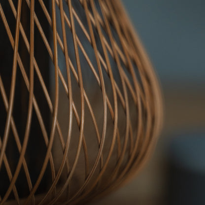 Japanese Bamboo Flower Vase "Fukuju" in brown styled in a styled room, detail lifestyle view.