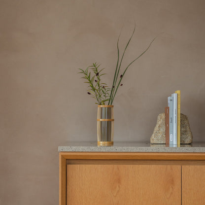 Japanese Bamboo Flower Vase "Shiori" in brown styled in a console table setting, console scene view.