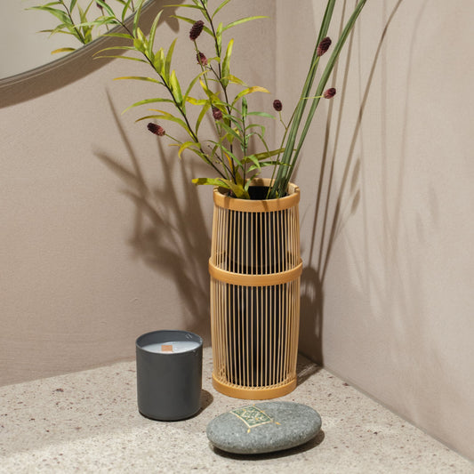 Japanese Bamboo Flower Vase "Shiori" in brown styled in a entryway setting, entryway scene view.