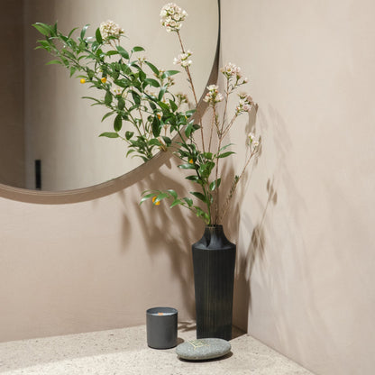 Japanese Cedar Ikebana Vase Indigo 02 in navy styled in a entryway setting, entryway scene view.