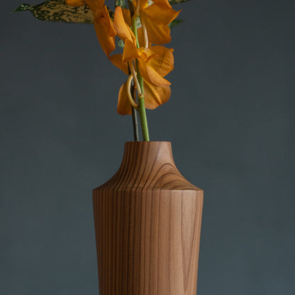 Japanese Cedar Ikebana Vase Natural Wood 02 in brown styled in a dining room setting, dining scene view.