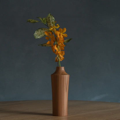 Japanese Cedar Ikebana Vase Natural Wood 02 in brown styled in a dining room setting, dining scene view.