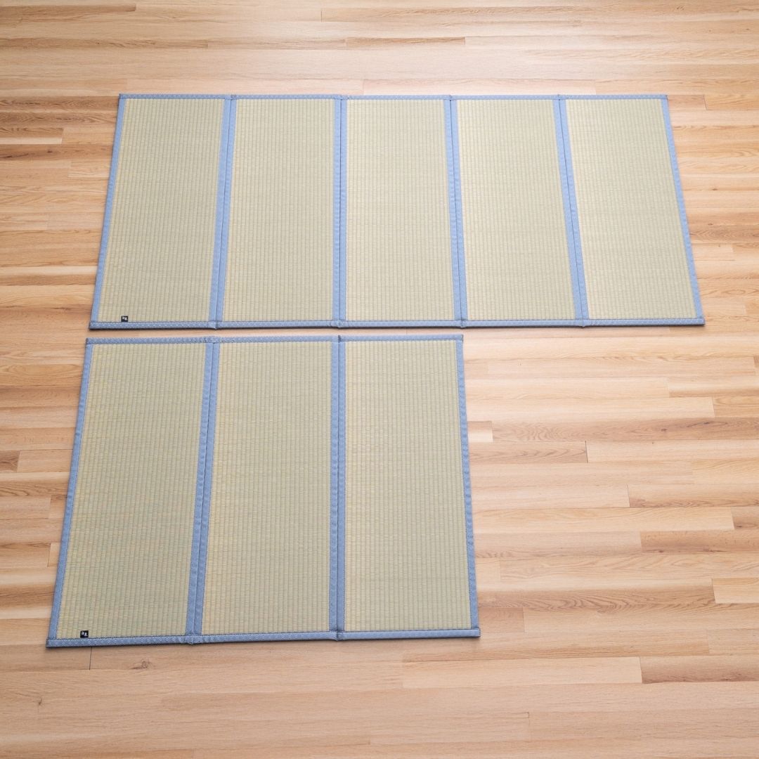 Asanoha tatami mattresses in 3 and 5 panel foldable sizes featuring traditional hemp leaf patterns on a wooden floor.