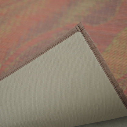 Corner of the Japanese Tatami Yoga Mattress "Marble" Pink lifted to reveal the non-slip TPE backing and stitched border.